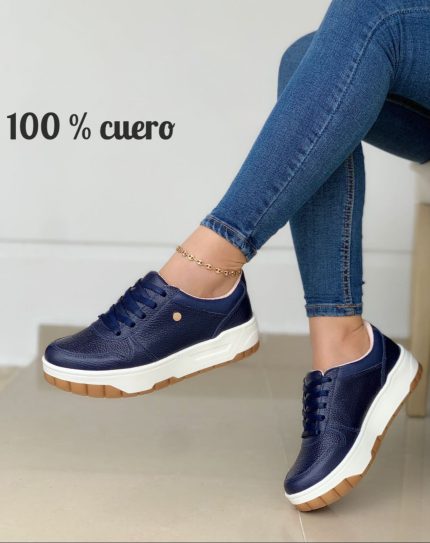 TENIS RAYAS EN LA SUELA